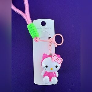 Hello Kitty Pink and Green Keychain that lights up